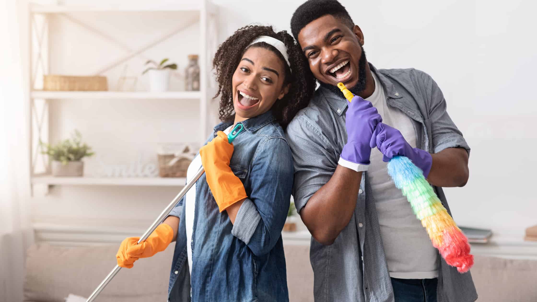 Mobile home cleaning checklist, couple smile after cleaning their mobile home.